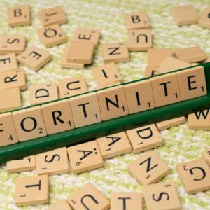Scrabble tiles forming the word Fortnite, symbolizing gaming creativity and fan art.